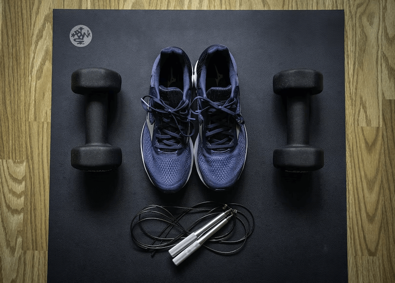 sneakers, dumbbells, and a jump rope